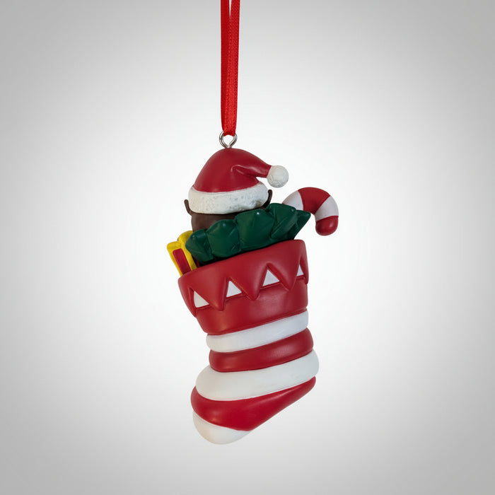 Back view of Buc-ee's Christmas Stocking Ornament with red and white stripes and festive decorations