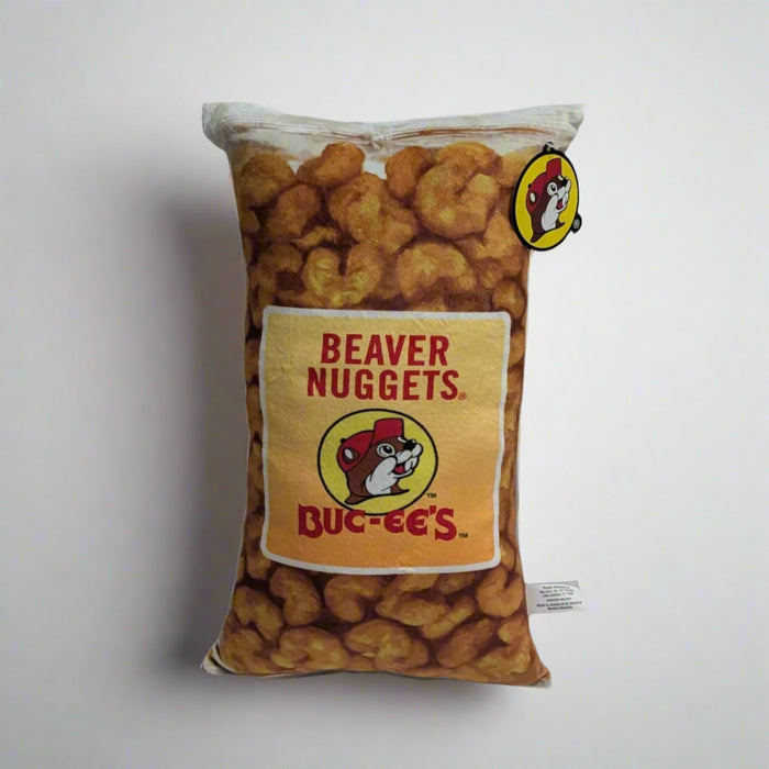 Buc-ee's Beaver Nugget Pillow the shape of a bag of Beaver Nuggets.
