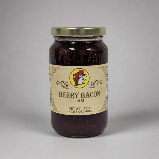 A 17 oz. jar of Berry Bacon Jam with a golden lid, featuring a rustic label and a rich, dark blend of smoky bacon and sweet berries visible through the jar.