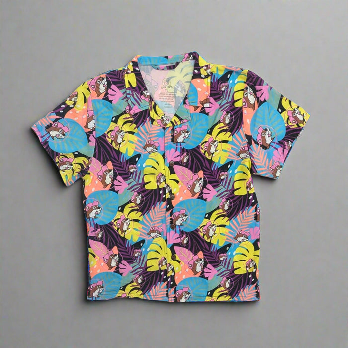 Buc-ee's Boys Tropcial Camper Shirt with palm tree colors of purple, pink, yellow and blue with logos all over.