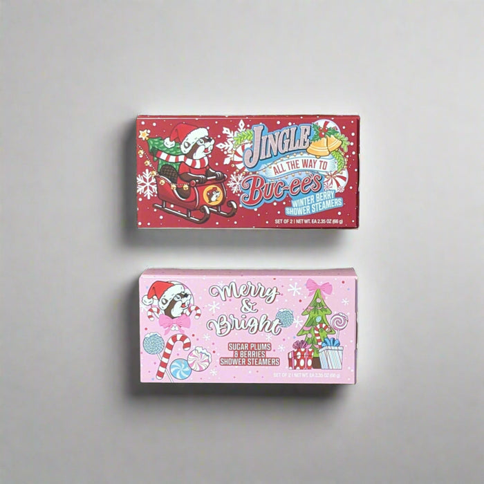 Turn your shower into a festive winter wonderland with these Buc-ee’s Christmas Shower Steamers! Each box includes a holiday-themed scent that fills your bathroom with Christmas cheer — whether you’re starting your day merry and bright or winding down after decking the halls.
The pink “Merry & Bright” steamer brings sweet and cheerful candy-inspired vibes, while the red “Jingle All the Way” steamer offers cozy, warm holiday notes perfect for the season. Drop one in the shower, let the steam rise, and enjoy