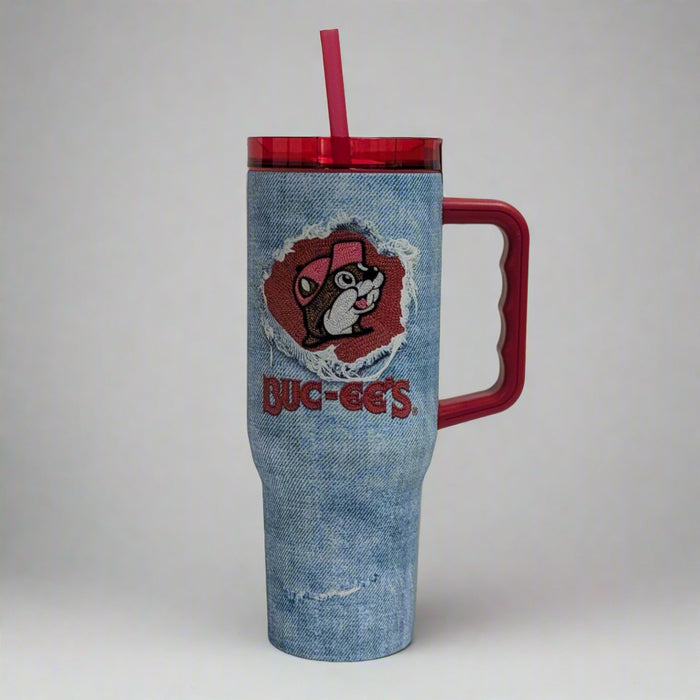 Buc-ee's Denim Tumbler with denim jean around it with the Buc-ee's logo in a red worn look.