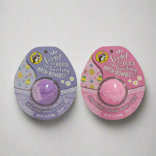 Buc-ee's Easter Bath Bombs with a purple lavender vanilla scent and pink strawberries Jasmine Peonies scent.