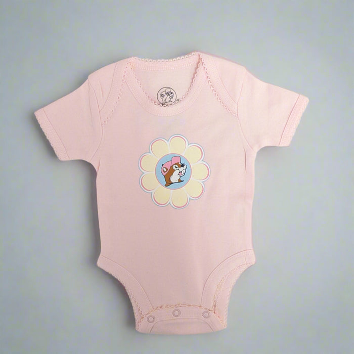 Buc-ee's Flower Onsie. Light pink onsie with a Buc-ee logo in a flower.