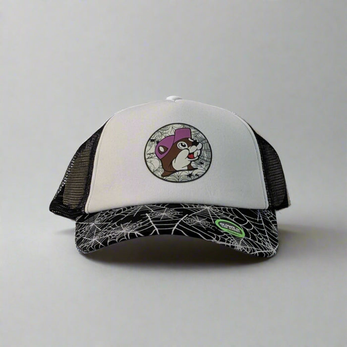 Front view of Buc-ee’s glow-in-the-dark trucker hat with spiderweb brim