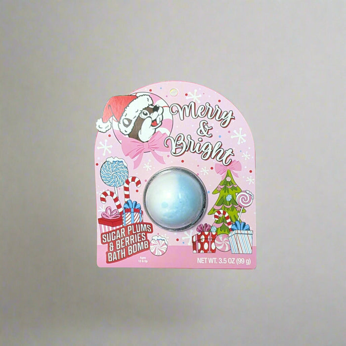 Buc-ee’s Christmas “Sugar Plum” bath bomb in pink packaging with Buc-ee in a Santa hat surrounded by candy canes and snowflakes.