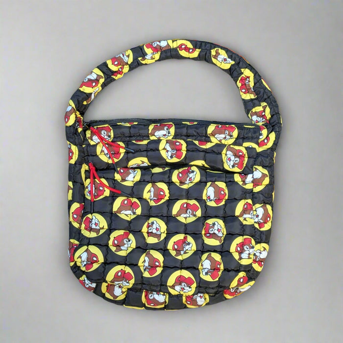 Buc-ee's Puff Tote Bag. Has a big main pocket with a front pocket. Has a puff like material and the classic Buc-ee's logos all over it.