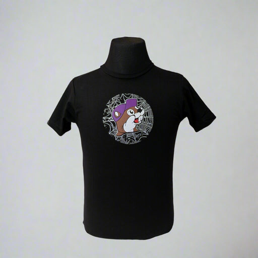 Buc-ee's "Put a Spell on Me" Halloween Shirt has a Buc-ee on the from surrounded with a spiderweb and he is wearing a purple hat.