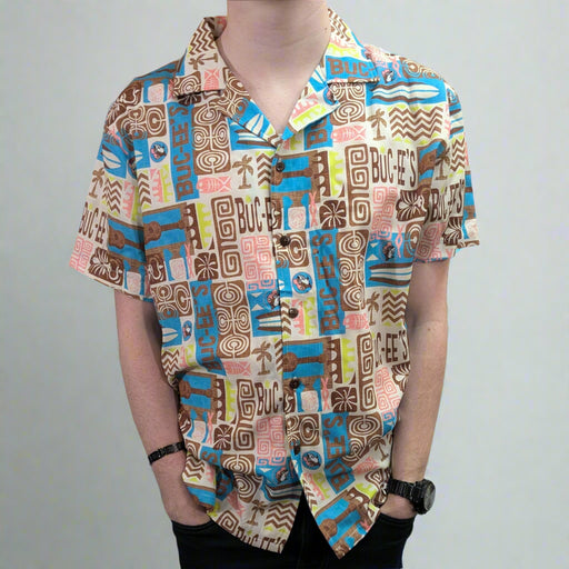 Buc-ee's Tiki Camper Shirt. Button down Tiki style with brown, blue, and peach coloring and designs.