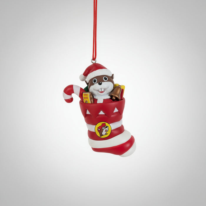 Front view of Buc-ee's Christmas Stocking Ornament featuring Buc-ee in a Santa hat with candy and snacks inside the stocking