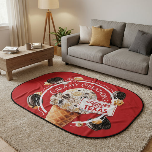 Red H-E-B Creamy Creations “Cookies Over Texas” double-sided throw blanket featuring images of ice cream, cookies, and waffle cones.