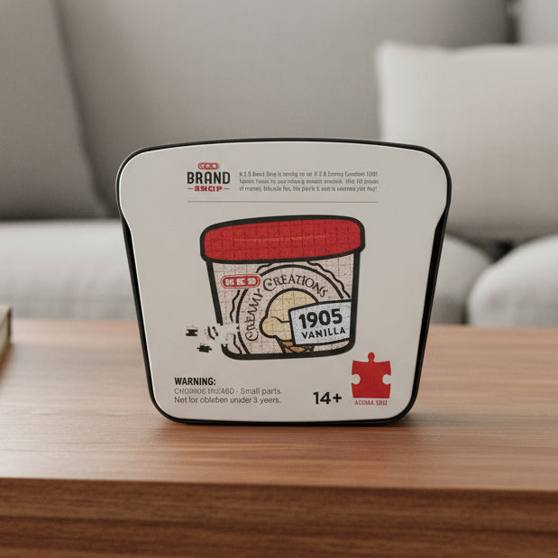 Back side of the H-E-B Creamy Creations 1905 Vanilla Puzzle container showing the completed puzzle image and product details.