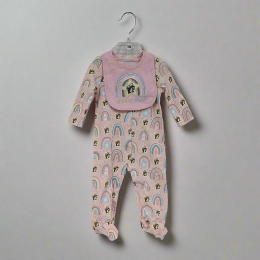 The pink rainbow sleeper with matching bib on a hanger
