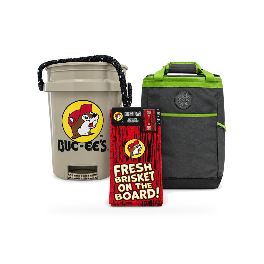 Buc-ee's bundle with a tan rope-handle bucket, gray and lime green cooler bag, and red Fresh Brisket on the Board kitchen towel