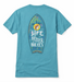 Back of the 'Life is Better at Buc-ee's' Turquoise Shirt showing a large surfboard graphic with palm trees, waves, and the text 'Life is Better at Buc-ee's'." Displayed on a clean white background.