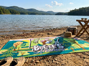 Benton Arkansas Beach Towel on a shore of a lake.