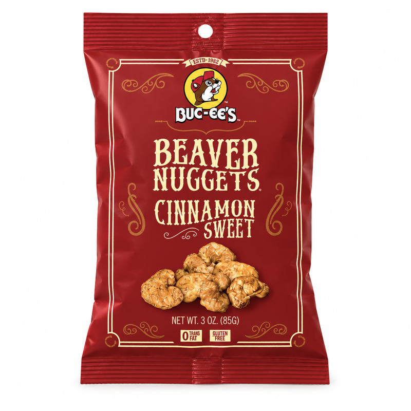 Red 3 oz bag of Buc-ee's Beaver Nuggets Cinnamon Sweet with nuggets in front, on white