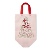 Soft pink Buc-ee's reusable tote bag with red handles featuring a botanical Christmas tree graphic topped with Buc-ee the Beaver in a Santa hat.