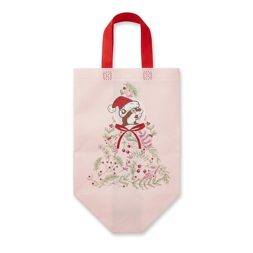 Soft pink Buc-ee's reusable tote bag with red handles featuring a botanical Christmas tree graphic topped with Buc-ee the Beaver in a Santa hat.