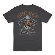 Back of a dark gray Buc-ee's t-shirt featuring a Western graphic of a cowboy riding a bucking horse with "Buc-ee's Local Legend" text.