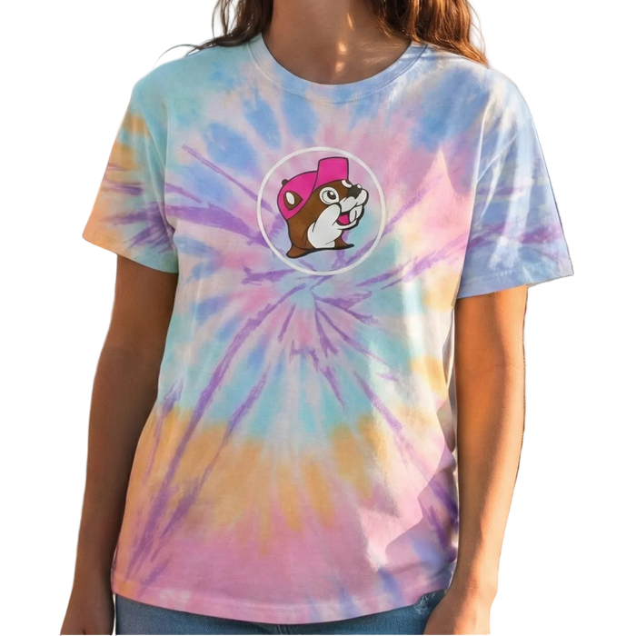 Woman wearing a tie-dye t-shirt with a cartoon character on a white background