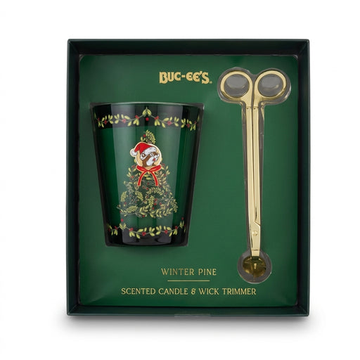 Buc-ee's Winter Pine Scented Candle and Gold Wick Trimmer gift set in a dark green windowed box, featuring a dark green glass candle decorated with a holiday tree and Santa-hat-wearing Buc-ee's logo next to a gold wick trimmer.