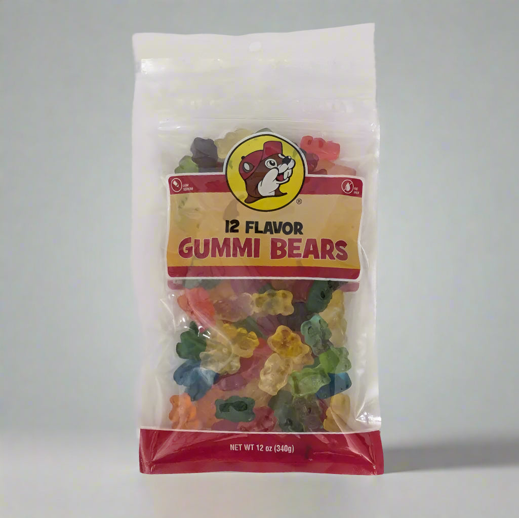 A clear plastic package of Buc-ee's 12 Flavor Gummi Bears with a red label showing the brand logo and the variety of gummy bears inside.