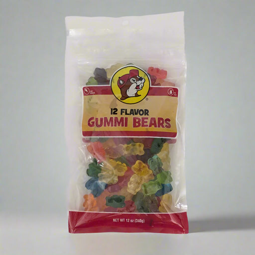 A clear plastic package of Buc-ee's 12 Flavor Gummi Bears with a red label showing the brand logo and the variety of gummy bears inside.