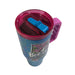 A high-angle, top-down view of the Buc-ee's Alabama tumbler showcasing its lid assembly. The image clearly displays the translucent hot-pink screw-on lid, a vibrant blue flip top tab on the spout, and the top portion of the pink plastic handle.