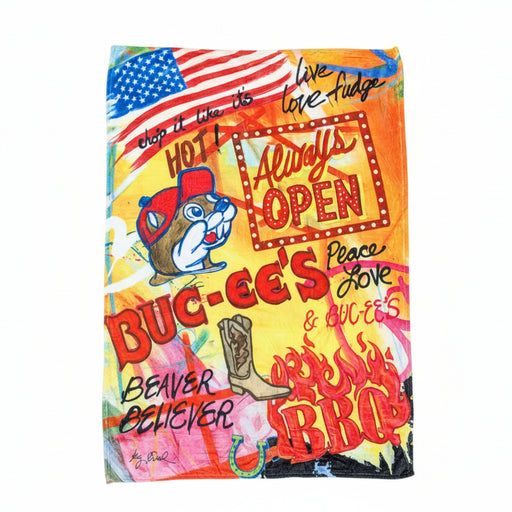 Buc-ee’s “Always Open” plush blanket with colorful collage-style design, Buc-ee the Beaver graphics, and bold text, laid flat on a clean white background.