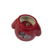 A product shot of the Buc-ee's America 250 Apple Pie Scented Candle against a solid white background. The image is taken from a high-angle perspective, showing the inside of the ceramic red sweater-shaped vessel. The white wax and single wick are visible, topped with a circular red dust cover featuring the yellow Buc-ee’s beaver logo. The front of the glossy red ceramic displays the commemorative America 250 graphic with Buc-ee in an Uncle Sam hat.