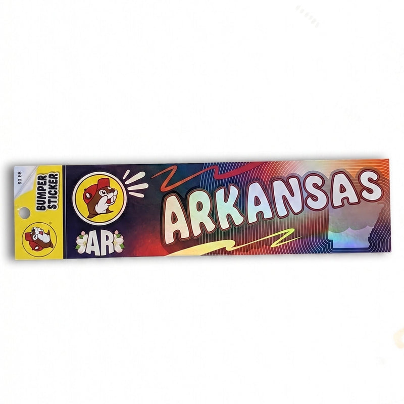 An Arkansas Razorbacks bumper sticker shown vertically on a plain white background. The sticker features the word 'ARKANSAS' in large white letters with a red outline, alongside the team logo and a yellow section at the bottom labeled 'BUMPER STICKER'.