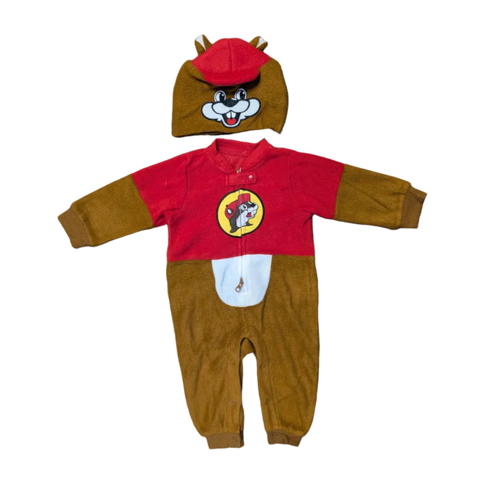 A two-piece Buc-ee's themed infant outfit laid flat on a white background. The set includes a brown and red long-sleeved fleece bodysuit featuring the Buc-ee's beaver logo on the chest and a white belly patch. Accompanying it is a matching brown fleece beanie designed to look like the beaver's face, complete with a small red brim and soft ears on top.