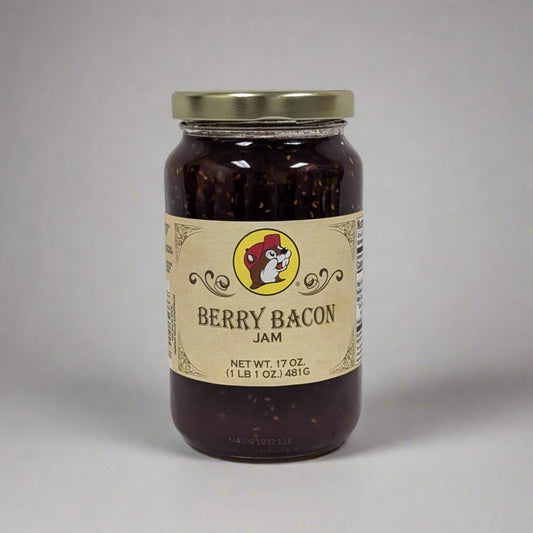 A 17 oz. jar of Berry Bacon Jam with a golden lid, featuring a rustic label and a rich, dark blend of smoky bacon and sweet berries visible through the jar.




