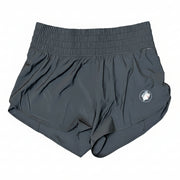 Buc-ee’s women’s black high-waist performance shorts with elastic waistband, fuchsia accents, and Buc-ee’s beaver logo displayed on a neutral background