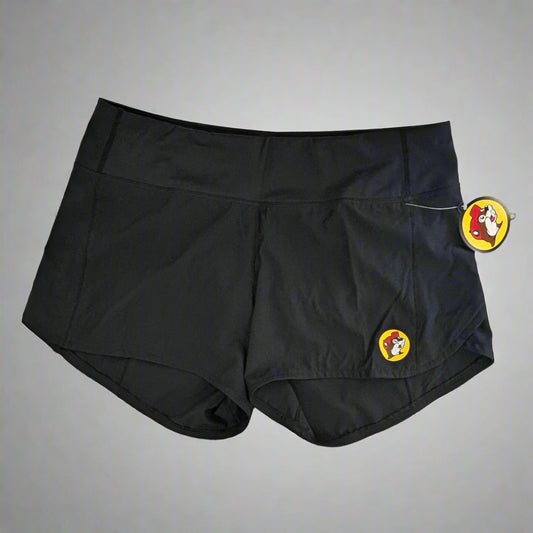 Buc-ee's Black Performance Shorts with Buc-ee's logo on it.