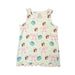 A top-down view of the Youth Blossoms & Bows Pajama Tank Top. The sleeveless top is a very light green with a repeating pattern of pink bows, blue flowers, and the Buc-ee's beaver mascot. It features a scooped neckline and a ruffled, pink lettuce-edge hem at the waist. Displayed on a clean white background.