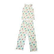 A top-down view of the Youth Blossoms & Bows Pajama Set pieces. A light green tank top is positioned above matching pajama pants, both featuring the signature pattern of pink bows, blue blossoms, and the Buc-ee's mascot. Both the tank top and the pants (which have no drawstring) are finished with a delicate, ruffled pink lettuce-edge hem. Displayed on a clean white background.