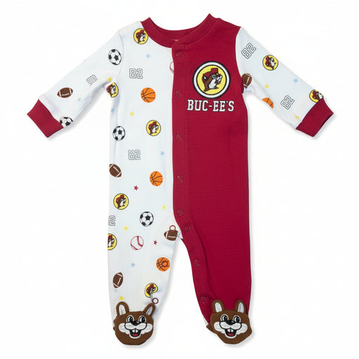 Buc-ee’s boy footed sleeper with red top, Buc-ee’s logo, white sports-print sleeves and legs, and beaver-face footies, displayed on a clean white background.