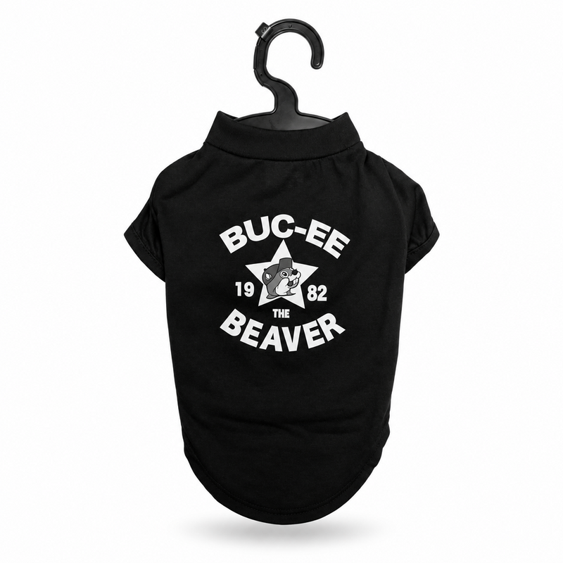 Black pet shirt on a hanger with white "Buc-ee the Beaver 1982" star graphic on the back, on white