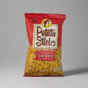 Buc-ee's Cajun Boil Potato Sticks in a red bag.