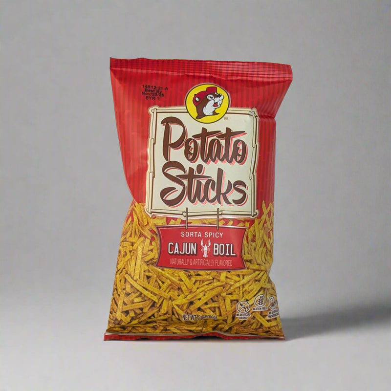Buc-ee's Cajun Boil Potato Sticks in a red bag.