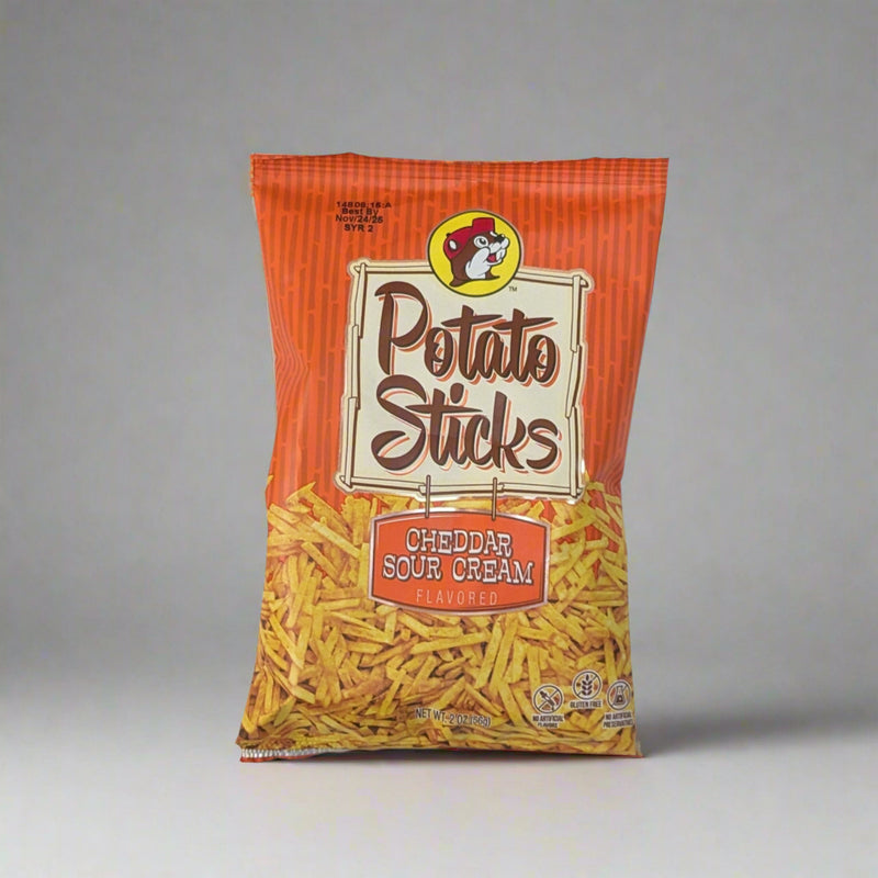 Buc-ee's Cheddar Sour Cream Potato Sticks in an orange bag.
