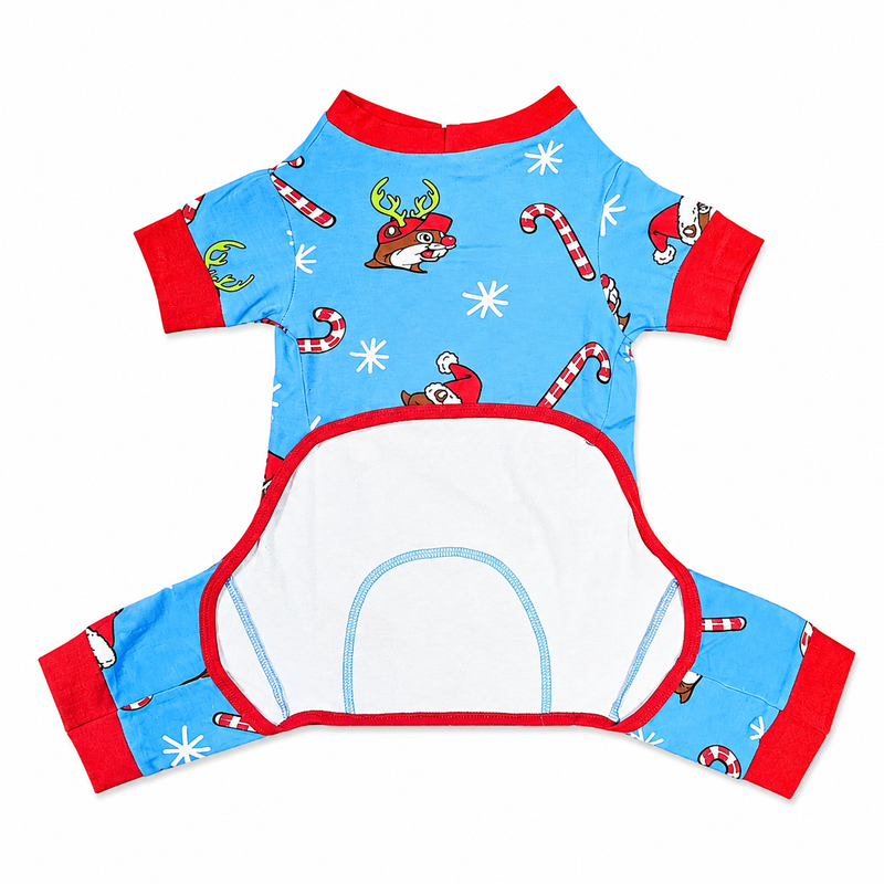 Back view of blue Buc-ee’s Christmas pet pajamas featuring a white belly panel with red trim, blue stitching, red cuffs, and an allover holiday print of beaver characters, candy canes, and white snowflakes.