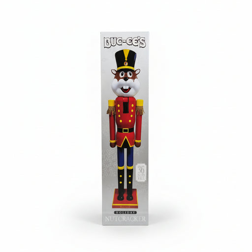 Nutcracker figure with packaging labeled 'Buc-ee's' on a white background