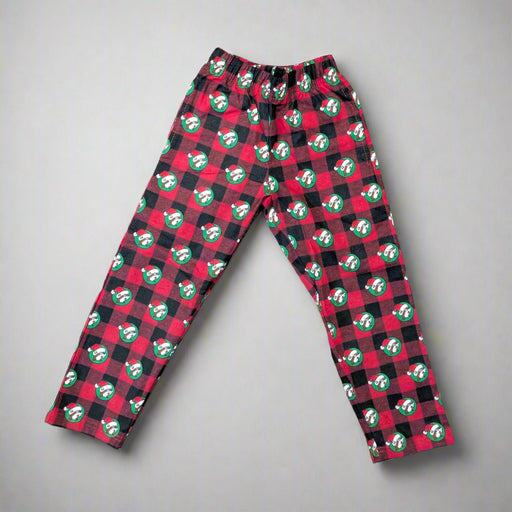 Full-length image of Buc-ee’s Christmas pajama pants displayed on a flat surface