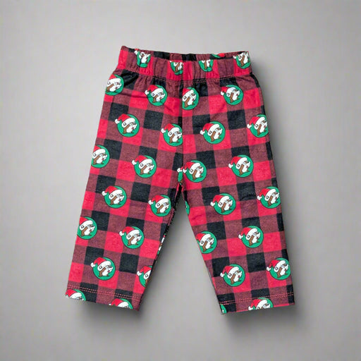 Front view of Infant Buc-ee's Christmas plaid pajama pants with red and green checkered pattern and beaver logo