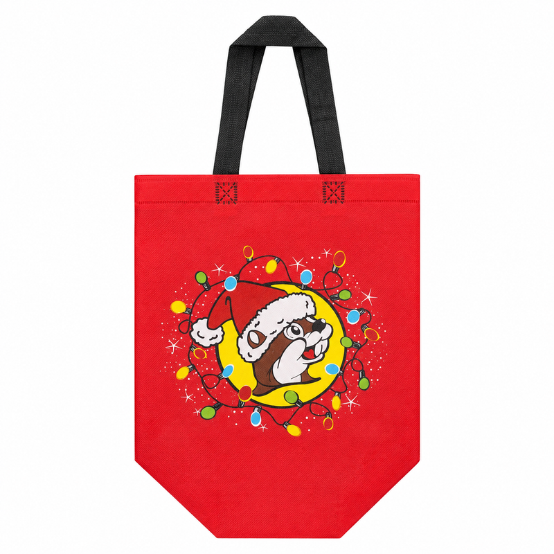 Bright red Buc-ee's reusable tote bag with black handles featuring Santa Buc-ee inside a yellow circle surrounded by colorful Christmas lights.