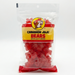 A product shot of a 12 oz bag of Buc-ee’s Cinnamon Juju Bears centered against a clean, solid white background. The clear resealable packaging prominently features the yellow Buc-ee’s beaver logo above bold black and red text reading "CINNAMON JUJU BEARS." Inside the bag, the large, thick, bright red bear-shaped candies are clearly visible. The lighting is bright and even, highlighting the glossy texture of both the packaging and the chewy candies.