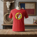 A red crew neck t-shirt with a graphic logo of a beaver in a circular design on the front.